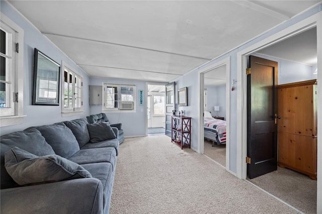 living room featuring carpet floors and cooling unit