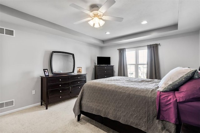 bedroom with light colored carpet, baseboards, visible vents, and recessed lighting