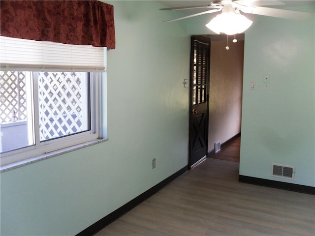 419 Streets Run Rd, Whitehall, PA 15236 - unfurnished room featuring baseboards, ceiling fan, wood finished floors, and visible vents
