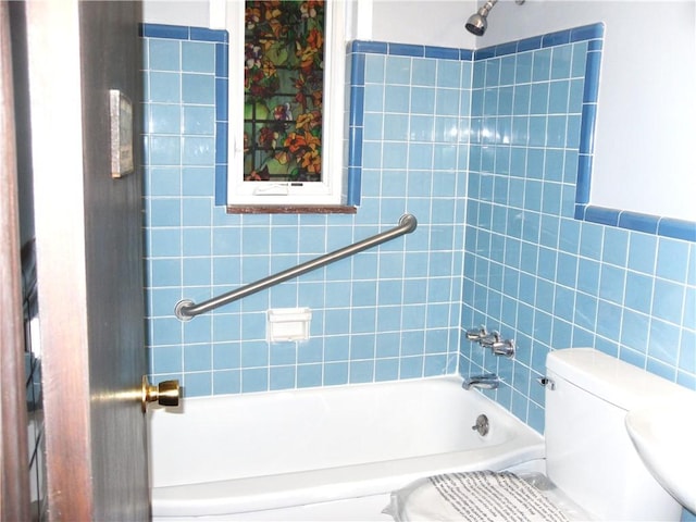 419 Streets Run Rd, Whitehall, PA 15236 - bathroom with tile walls, toilet, and tub / shower combination