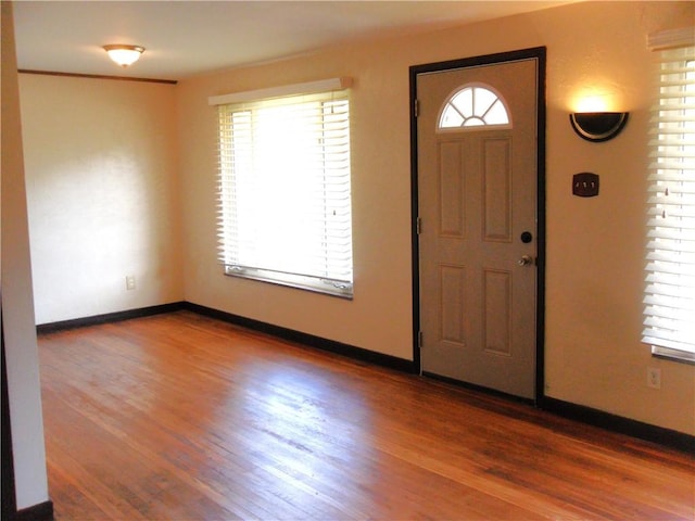 419 Streets Run Rd, Whitehall, PA 15236 - entryway with a healthy amount of sunlight, baseboards, and wood finished floors