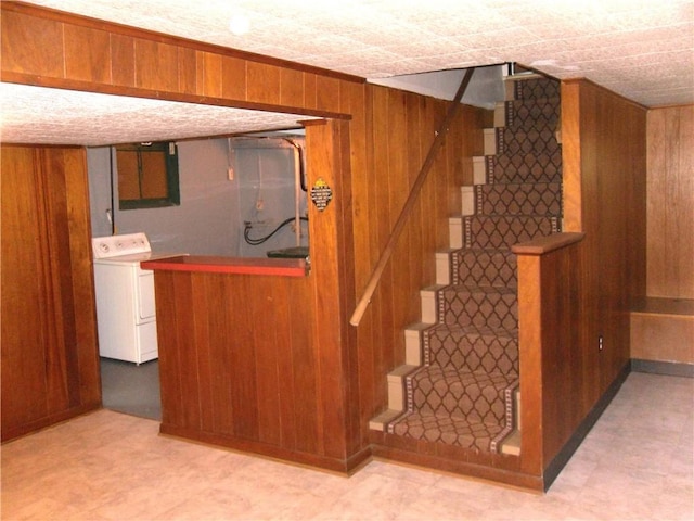 419 Streets Run Rd, Whitehall, PA 15236 - stairway with bar, washer / clothes dryer, and wooden walls