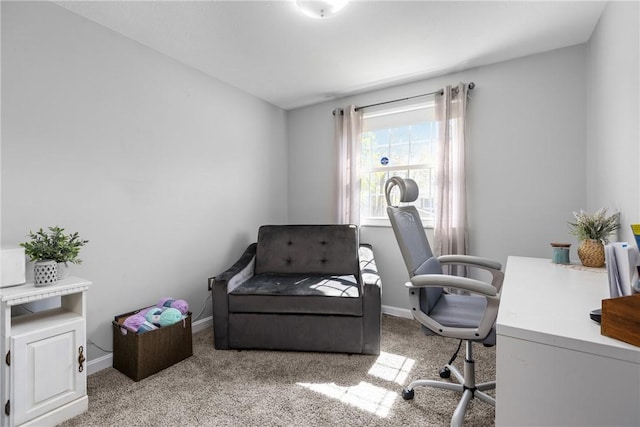 carpeted office featuring baseboards