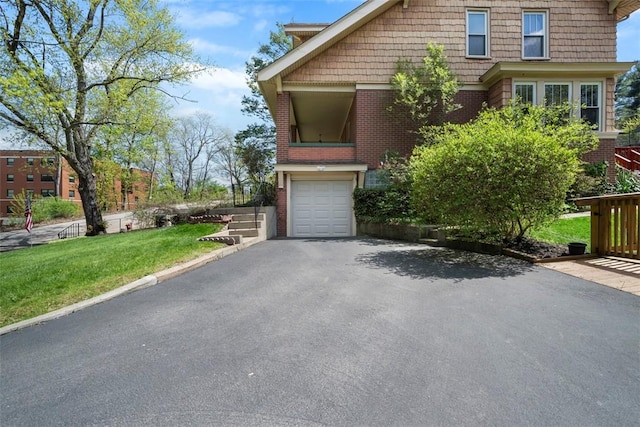 508 Cascade, Forest Hills Boro, PA 15221 - view of front of property featuring brick siding, a garage, a front lawn, and driveway