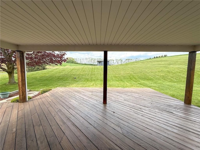 deck featuring a lawn