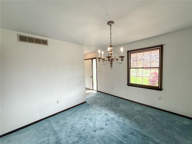 unfurnished dining area featuring carpet flooring, a chandelier, baseboards, and visible vents