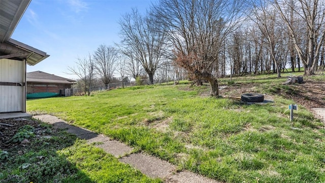 view of yard featuring fence
