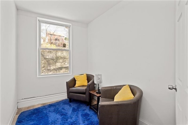 sitting room featuring baseboards