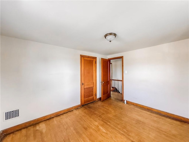 2103 Oriole Dr, Hopewell Twp Bea, PA 15001 - spare room featuring visible vents, baseboards, and light wood-style floors