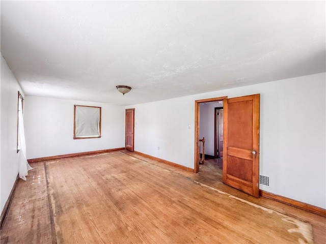 2103 Oriole Dr, Hopewell Twp Bea, PA 15001 - spare room featuring baseboards and light wood-style flooring