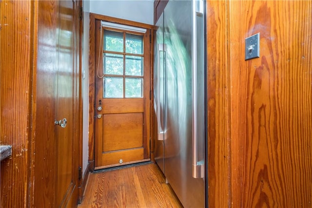 doorway with wood finished floors