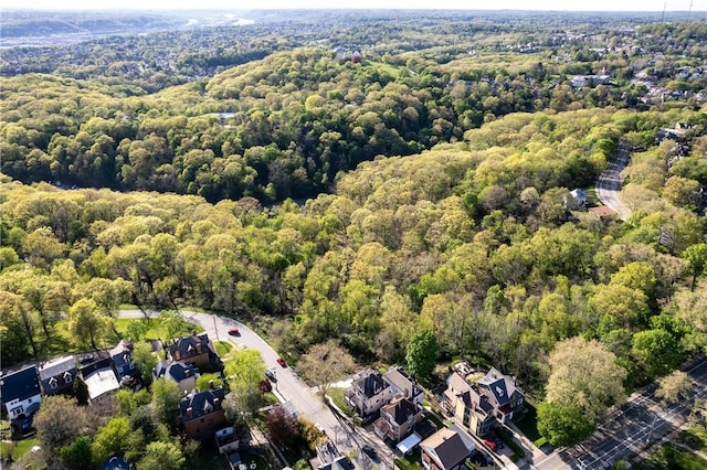 aerial view with a view of trees and a residential view