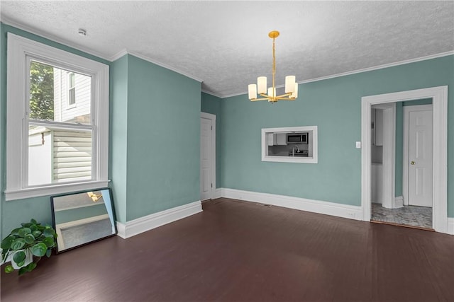 interior space featuring a textured ceiling, a chandelier, and wood finished floors