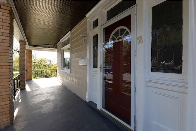 property entrance with a porch