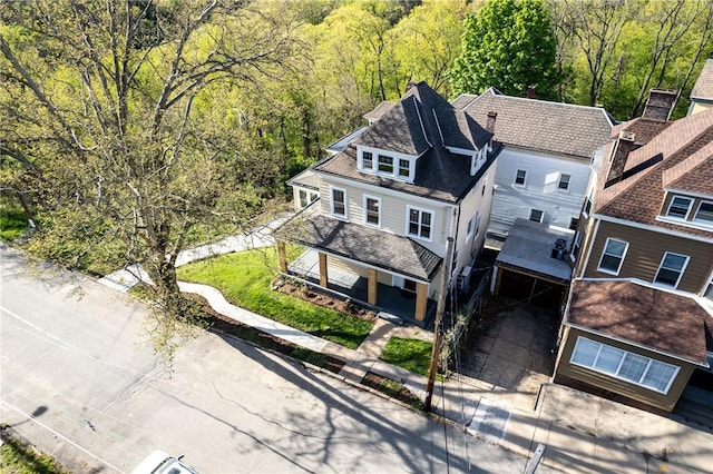 drone / aerial view with a view of trees