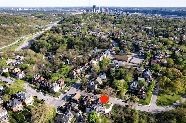 birds eye view of property with a residential view
