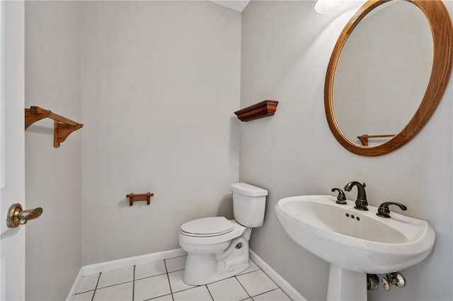 1641 Blackburn Heights Dr, Franklin Park, PA 15143 - bathroom with a sink, tile patterned floors, baseboards, and toilet