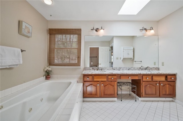 1641 Blackburn Heights Dr, Franklin Park, PA 15143 - full bathroom featuring a sink, tile patterned flooring, double vanity, a tub with jets, and a skylight