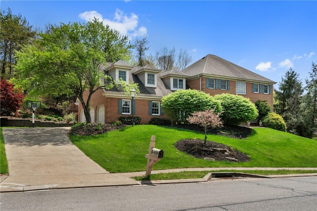 1641 Blackburn Heights Dr, Franklin Park, PA 15143 - view of front of property featuring brick siding, driveway, and a front lawn