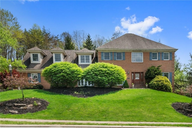 1641 Blackburn Heights Dr, Franklin Park, PA 15143 - view of front facade with brick siding, a shingled roof, and a front lawn