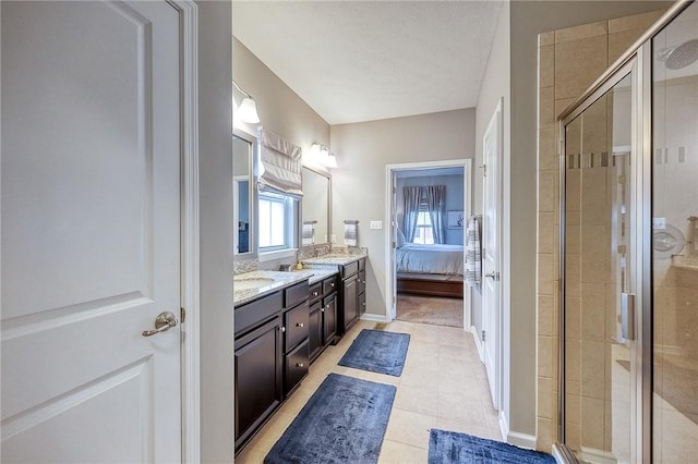 2008 Connecticut Ln, Franklin Park, PA 15143 - full bathroom featuring double vanity, a shower stall, ensuite bathroom, tile patterned flooring, and baseboards
