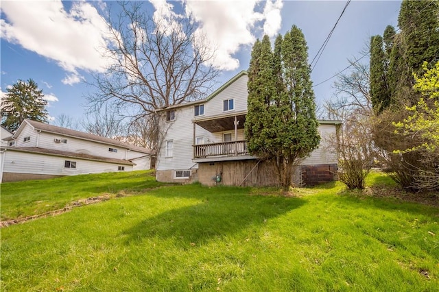 back of property with a yard