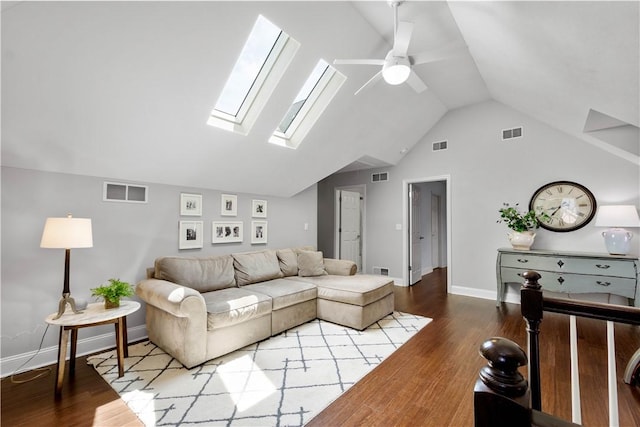 1501 Appleridge Ct, Adams Twp, PA 15044 - living room featuring a skylight, ceiling fan, vaulted ceiling, baseboards, and wood finished floors