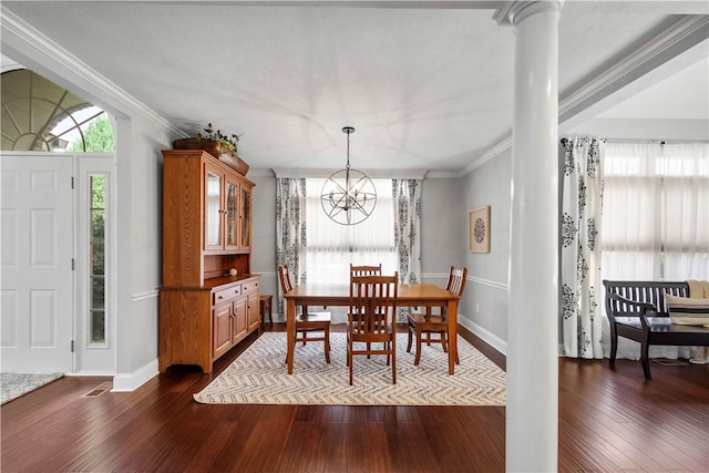 1501 Appleridge Ct, Adams Twp, PA 15044 - dining area featuring a chandelier, baseboards, dark wood finished floors, ornamental molding, and decorative columns
