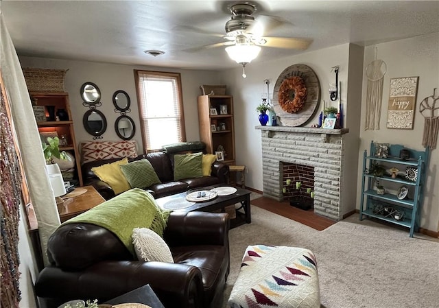 338 Prestley Rd, Bridgeville, PA 15017 - carpeted living area featuring a ceiling fan, a stone fireplace, and visible vents