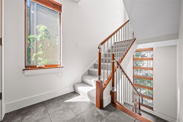staircase with baseboards