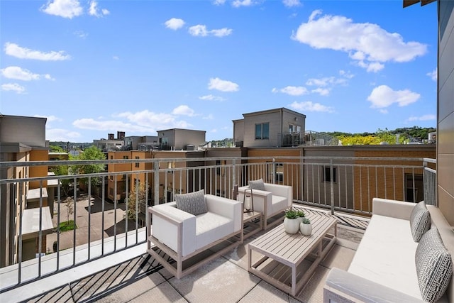 view of patio / terrace with outdoor lounge area and a balcony