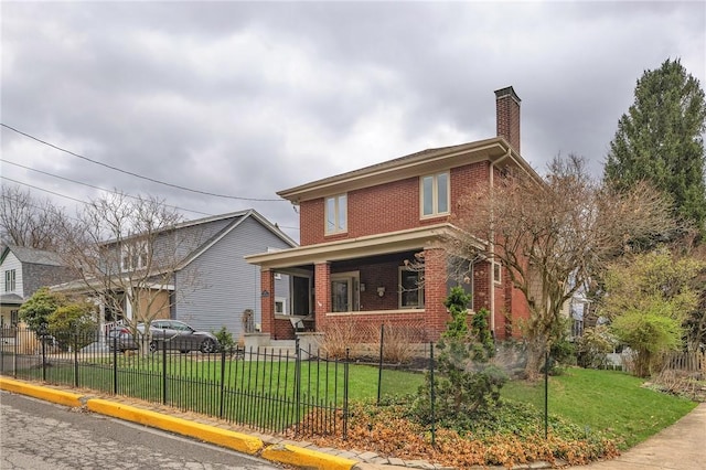 view of front of house featuring a porch, brick siding, a chimney, and a front yard