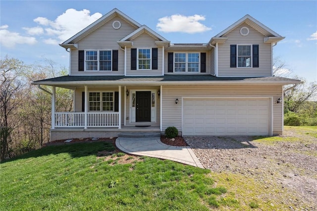 view of front facade featuring a garage, a porch, driveway, and a front yard