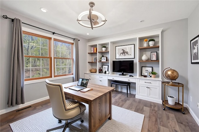home office with recessed lighting, baseboards, dark wood finished floors, and visible vents