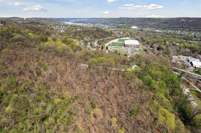 drone / aerial view with a view of trees
