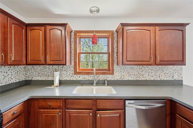 kitchen with stainless steel dishwasher, hanging light fixtures, decorative backsplash, and a sink