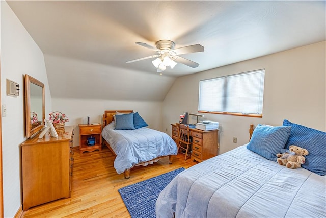 500 11th St, Oakmont, PA 15139 - bedroom featuring a ceiling fan, vaulted ceiling, and light wood-style flooring
