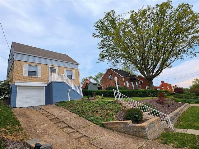 3241 Shadyway Dr, Brentwood, PA 15227 - view of front of property with brick siding, stairs, a garage, and driveway