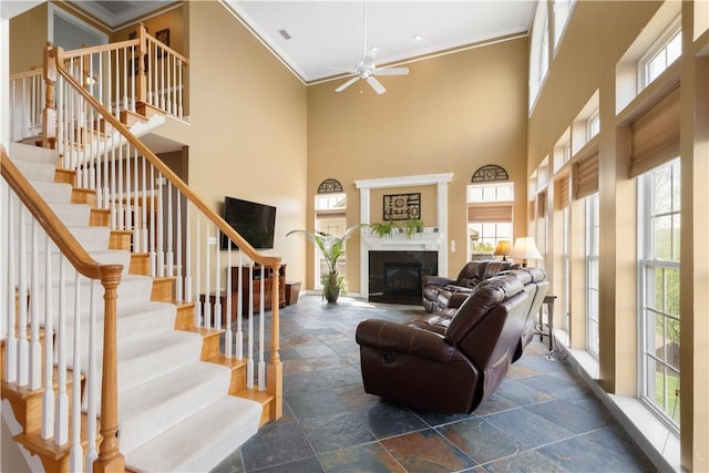 342 Buffalo Ridge Rd, Peters Twp, PA 15317 - living room featuring ornamental molding, stone tile floors, and a healthy amount of sunlight