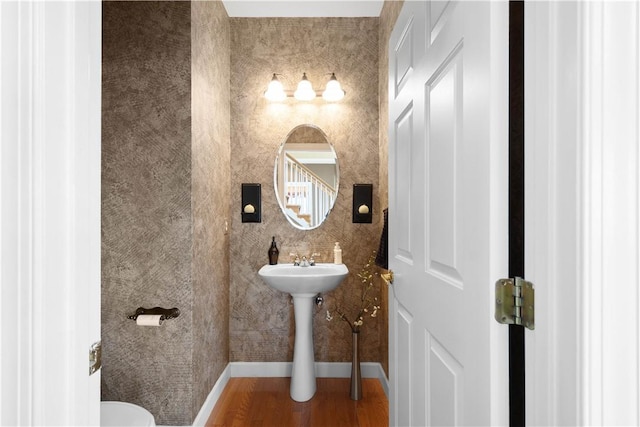 342 Buffalo Ridge Rd, Peters Twp, PA 15317 - bathroom with baseboards, toilet, and wood finished floors