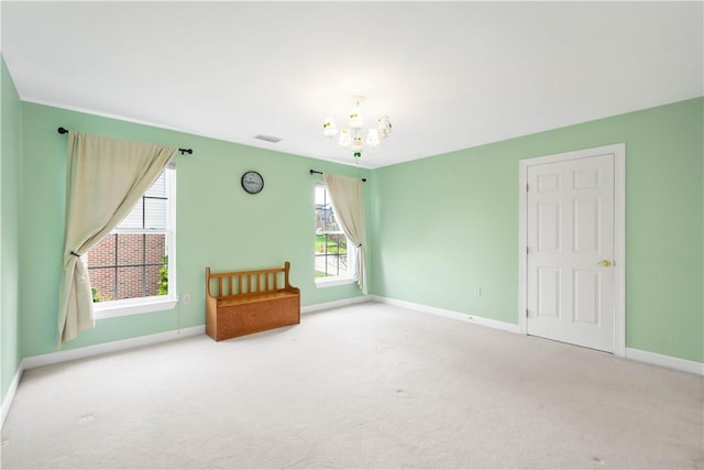 342 Buffalo Ridge Rd, Peters Twp, PA 15317 - empty room featuring an inviting chandelier, baseboards, and carpet flooring