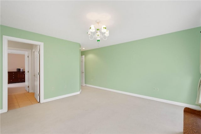 342 Buffalo Ridge Rd, Peters Twp, PA 15317 - carpeted empty room with an inviting chandelier and baseboards