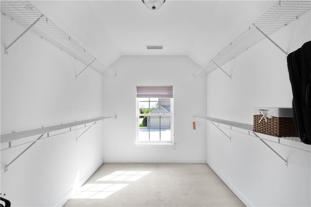 342 Buffalo Ridge Rd, Peters Twp, PA 15317 - walk in closet featuring light colored carpet, visible vents, and lofted ceiling