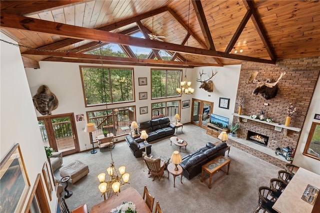 209 Claypoole Hill Rd, Bethel Twp, PA 16226 - carpeted living area featuring a brick fireplace, high vaulted ceiling, beam ceiling, and wooden ceiling