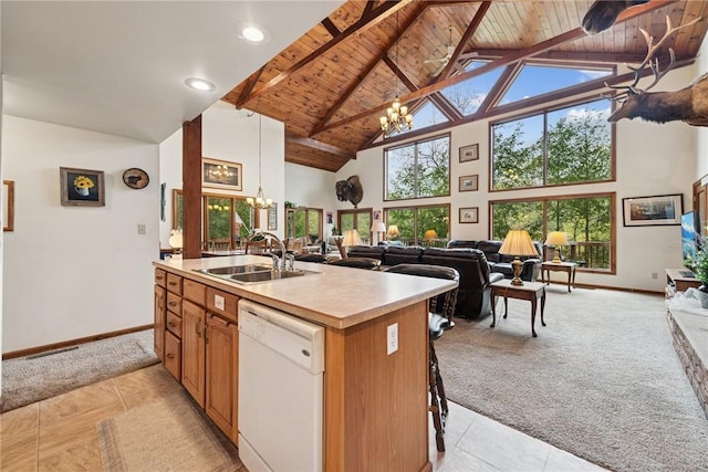 209 Claypoole Hill Rd, Bethel Twp, PA 16226 - kitchen featuring an inviting chandelier, light carpet, open floor plan, a sink, and dishwasher