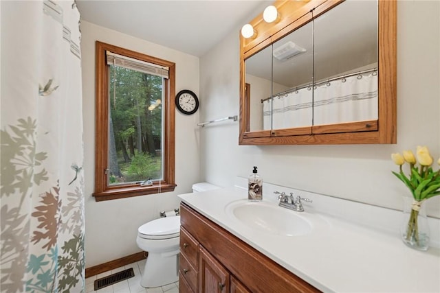 209 Claypoole Hill Rd, Bethel Twp, PA 16226 - full bathroom featuring visible vents, tile patterned flooring, vanity, toilet, and baseboards