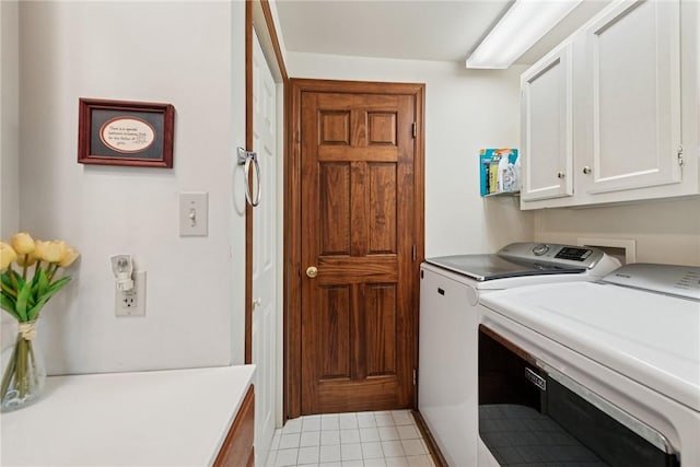 209 Claypoole Hill Rd, Bethel Twp, PA 16226 - clothes washing area featuring light tile patterned flooring, independent washer and dryer, and cabinet space