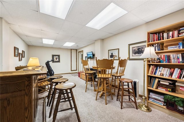 209 Claypoole Hill Rd, Bethel Twp, PA 16226 - dining area featuring carpet floors, a dry bar, a paneled ceiling, and baseboards