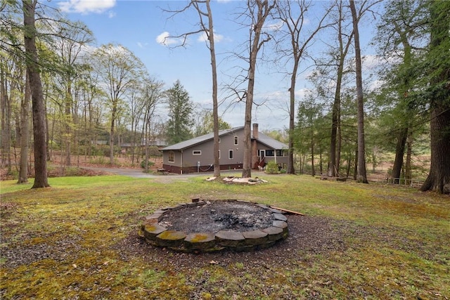 209 Claypoole Hill Rd, Bethel Twp, PA 16226 - view of yard with an outdoor fire pit
