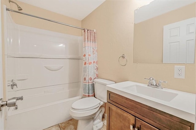bathroom featuring vanity, tile patterned flooring, shower / bath combo, and toilet